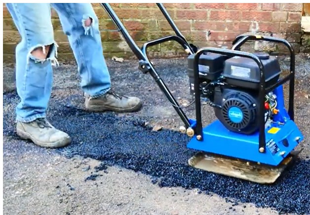 compactor plate on cold lay tar